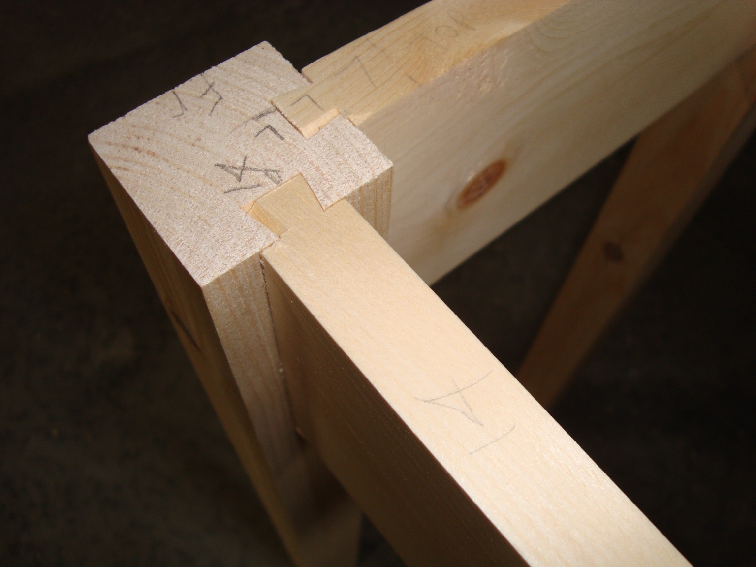 ... sides and back are made from gluing side-to-side strips of pallet wood