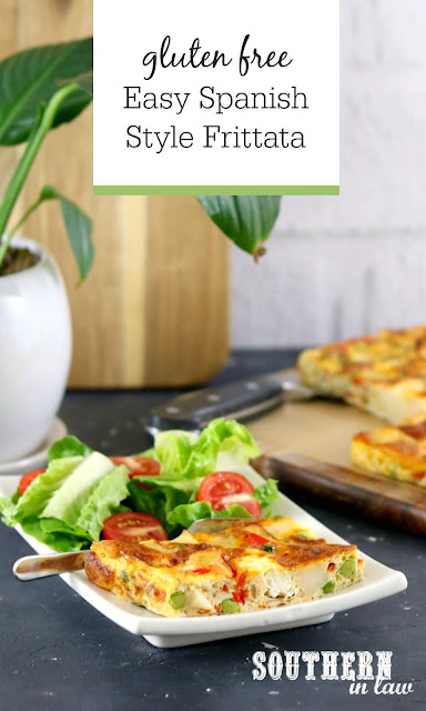 Easy Spanish Style Frittata Recipe - Gluten Free Potato Peas and Red Capsicum Frittata on White Rectangle Plate with Salad