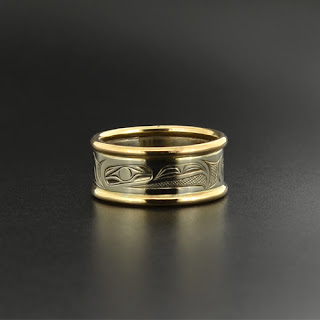 http://www.lattimergallery.com/products/14k-white-gold-ring-by-david-neel-5305