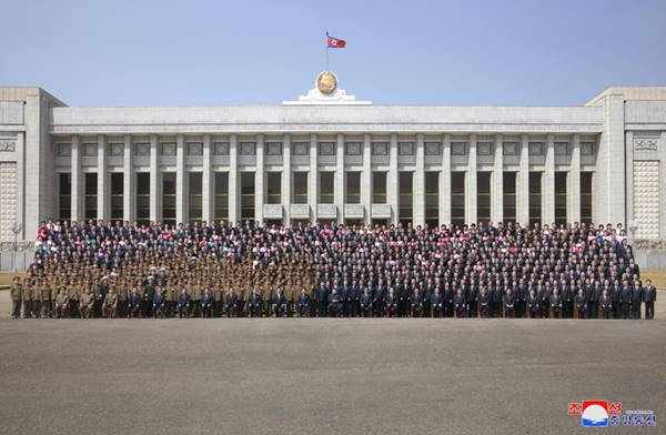 kim jong un with deputies to the 14th spa