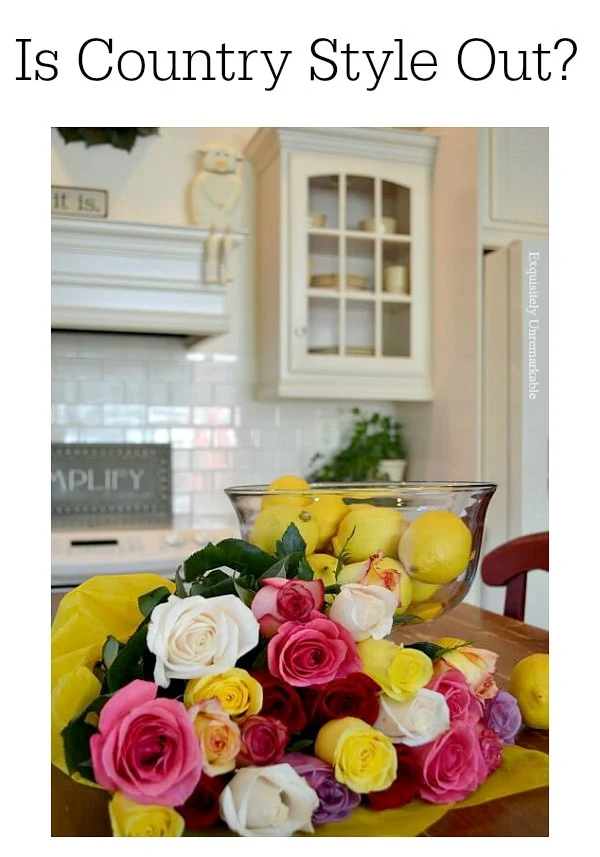 Is Country Style Out Of Style? Text over photo of country style kitchen with roses and lemons