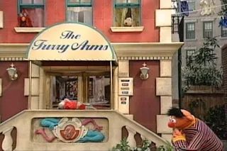Ernie finds a key in front of The Furry Arms Hotel. Sesame Street 123 Count with Me