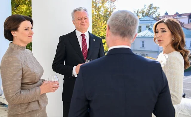 Lithuania’s President, Gitanas Nauseda, and his wife, Diana Nausediene. Crown Princess Mary wore a tweed dress