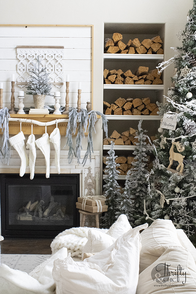 Cozy living room christmas decor. Woods and white Christmas decor. farmhouse christmas decor and decorating ideas. Neutral Christmas mantel decor
