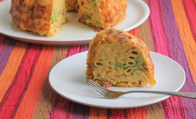 Food Lust People Love: This bacon broccoli mac and cheese Bundt is a delicious main course made with a wonderful cheesy sauce that includes heavy cream, extra sharp cheddar and five whole eggs. This Bundt is much more than just baking your usual mac and cheese in a Bundt pan. The bacon, broccoli and eggs make this a full meal. Leftovers, if you should be so fortunate as to have any, are just as delicious the next day.