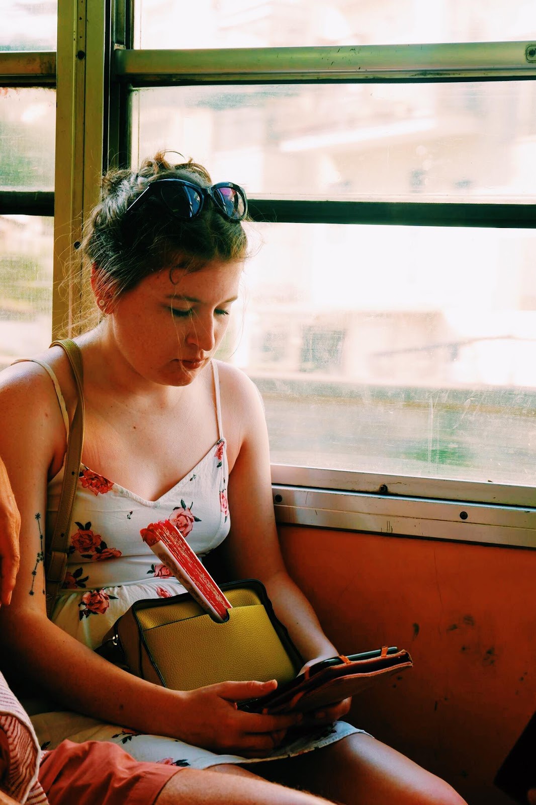 Sister sitting on a circumvesuviana train