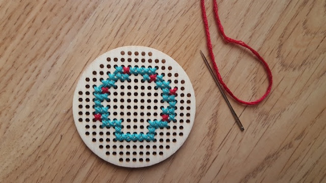 Cross stitched wooden Christmas wreath ornament - with free pattern