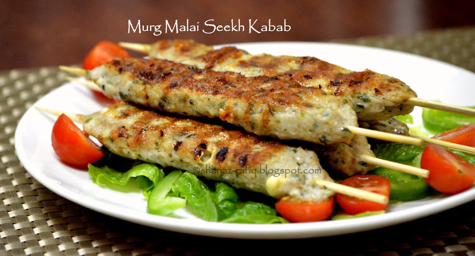 Image result for How to make Cheesy Seekh Kabab - Cheese mixed with chicken mince and masalas, wrapped around satay sticks and grilled