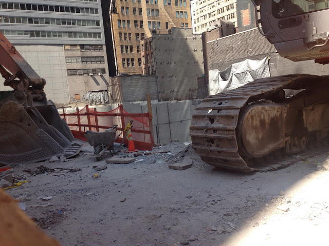 Photo of excavator machine on the site