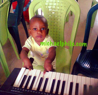 child playing the chromatic scale on the piano