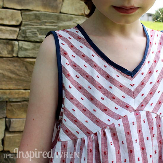 Cut yoke stripes on the bias for a classic striped blouse. Sewing pattern from Sew Chic Kids | The Inspired Wren
