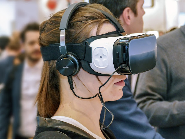 woman using VR headset 