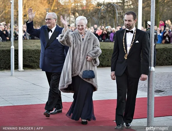 Queen Margrethe of Denmark and Prince Henrik arrive at the Music Hall in Aarhus next to Aarhus Mayor Jacob Bundsgaard for a birthday event for the Danish Queen