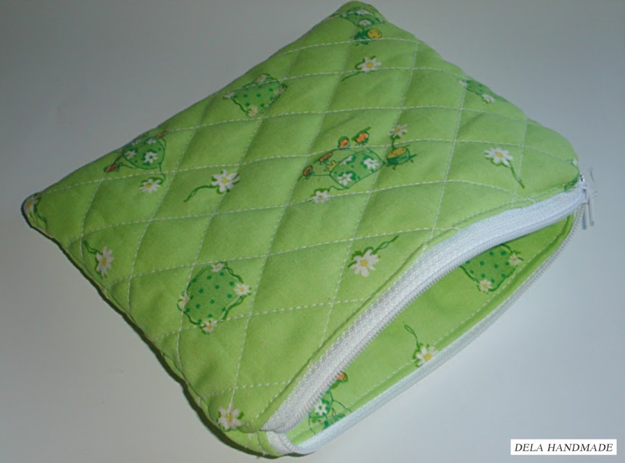 <img src="Neceser-vaquitas.png" alt="Neceser acolchado con alegre estampado de vaquitas">. 