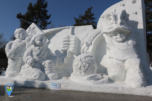 Celebrating Chinese New Year festival with fireworks and dragon dance at Harbin Snow Sculpture Art Expo in Heilongjiang province, China Celebrating Chinese New Year festival with fireworks and dragon dance at Harbin Snow Sculpture Art Expo in Heilongjiang province, China