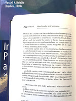 A photo of Appendix 1 from Structures: Or Why Things Don't Fall Down, superimposed on the cover of Intermediate Physics for Medicine and Biology.