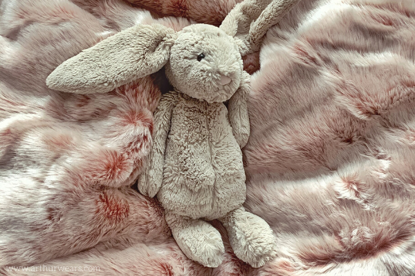 Grey jellycat rabbit on Dusky blush rose pink and grey faux fur