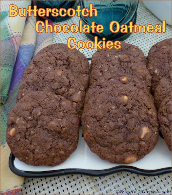 Butterscotch Chocolate Oatmeal Cookies are crispy on the outside, chewy on the inside chocolate flavored oatmeal cookies studded with little bursts of butterscotch. | Recipe developed by www.BakingInATornado.com | #recipe #cookies