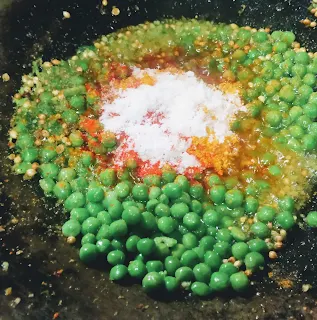 Sauteing green peas, turmeric powder crush Coriander seeds, cumin powder Garam masala salt for samosa filling recipe