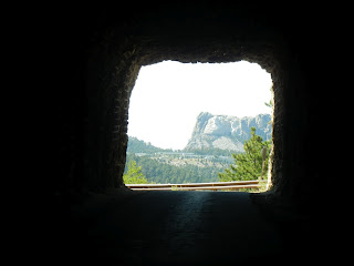 Views of Mount Rushmore from a tunnel in Custer State Park in South Dakota