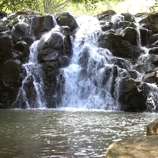 Cascading Waterfall Over Rocks -Mauritius Wallpaper Engine