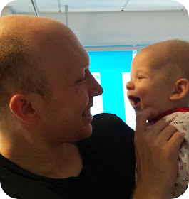 father and son, baby in hospital, father son smiles