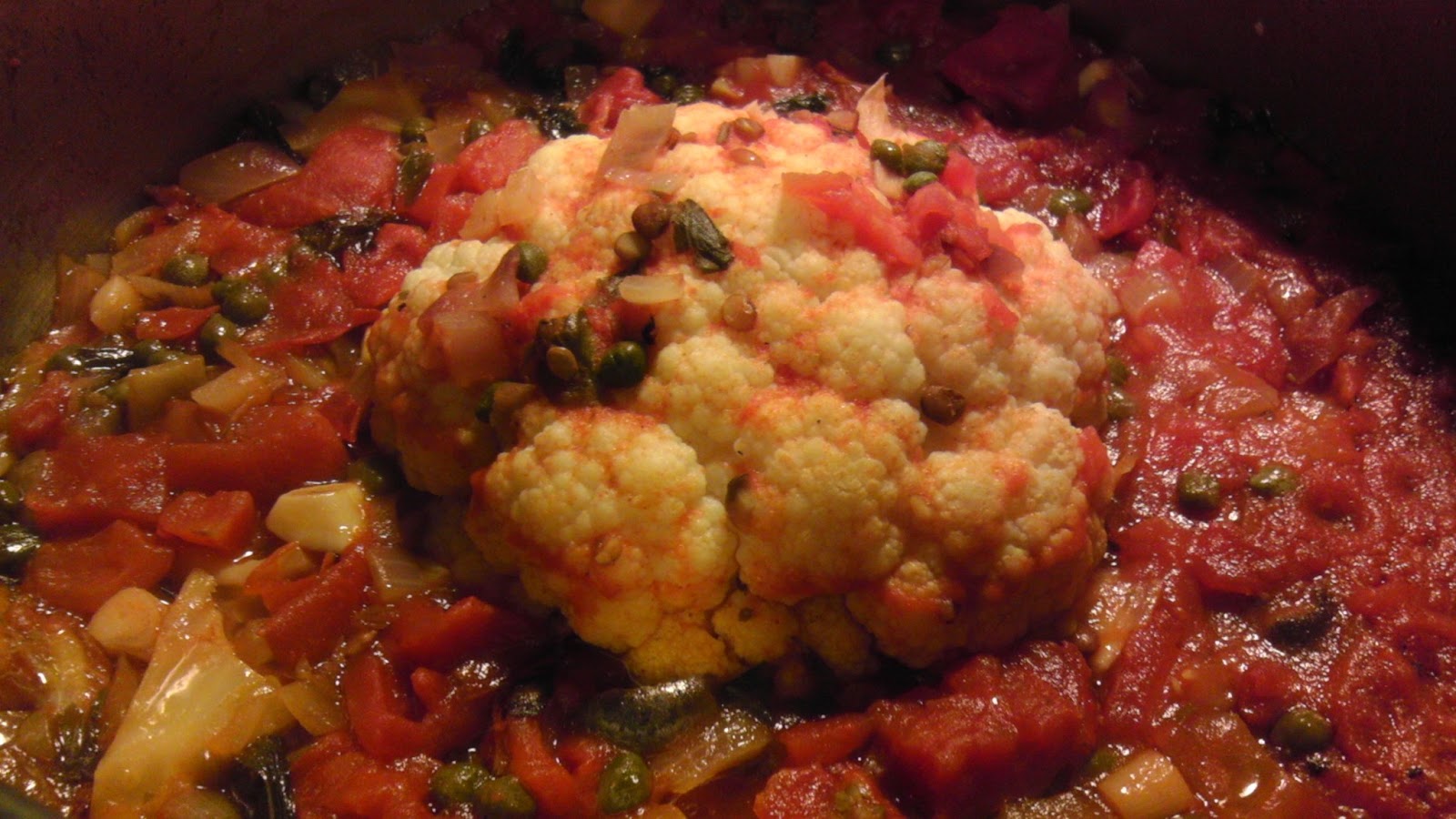 Veg Yum! Braised Whole Cauliflower in Tomato Olive Sauce