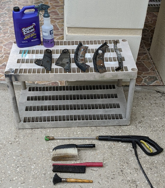 Pressure washing cleaning parts before powder coating