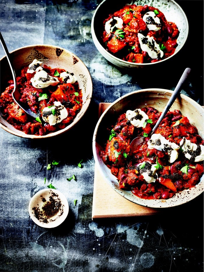Kidney Bean & Sweet Potato Stew in bowls topped with yoghurt and mint oil