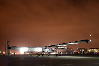 Crescent moon rising above the Solar Impulse 2, Moffett Field, Mountain View, California