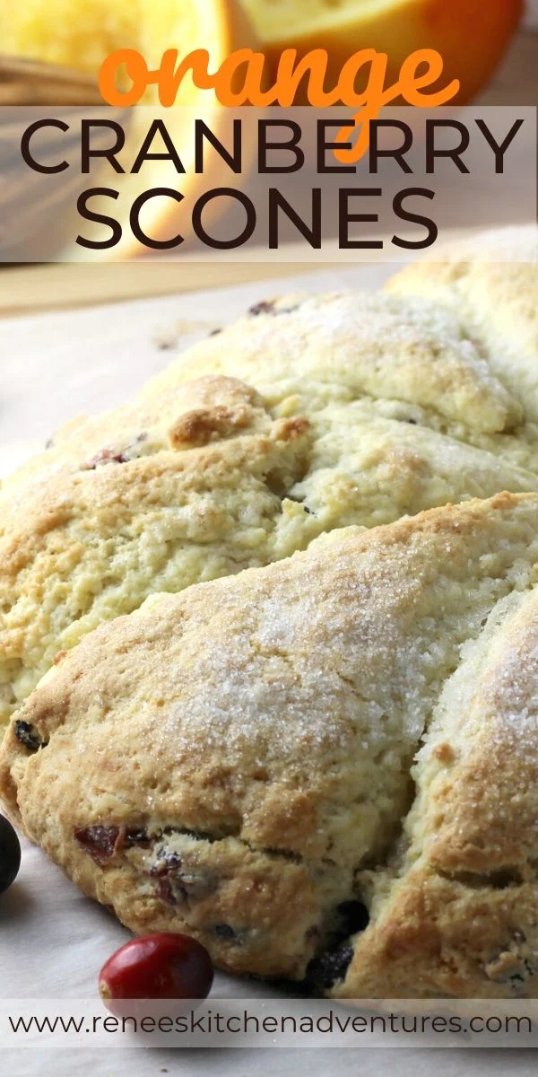 Easy Orange Cranberry Scones by Renee's Kitchen Adventures pin with image of scones on a board and text overlay for Pinterest