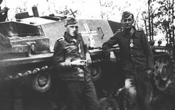 Michael Wittmann (left) with StuG III Ausf.A, 12 July 1941 worldwartwo.filminspector.com