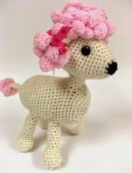 http://www.ravelry.com/patterns/library/pomp-a-puppy#