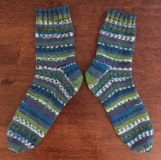 Socks hand-knitted with DROPS Fabel Green/Turquoise