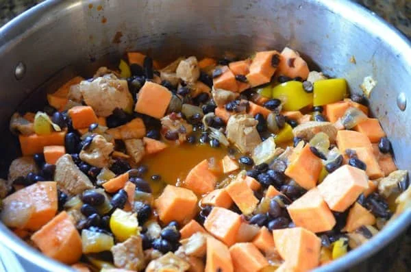 Black Beans, Sweet Potato, Bell Pepper added to Sweet Potato Chili Recipe in Soup pot.