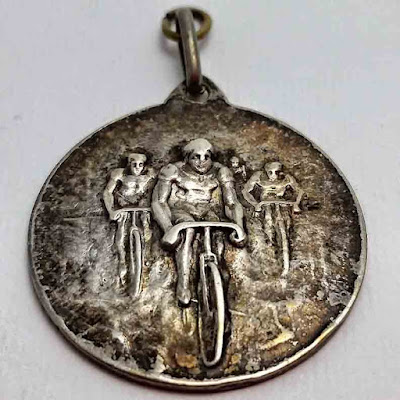 a vintage cycling silver medal