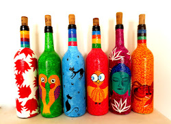 painted hand bottles recycle reuse rehydrate