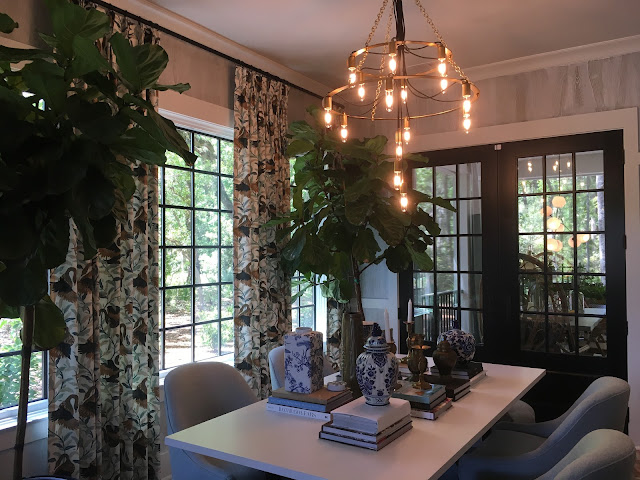 Fiddle leaf fig trees and curtains and gorgeous chandelier in a cottage farmhouse in Palmetto Bluff, SC | The Lowcountry Lady