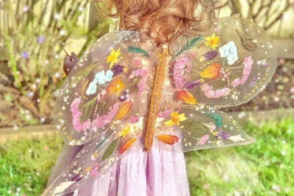transparent fairy butterfly wings made with tacky back plastic and pressed flowers