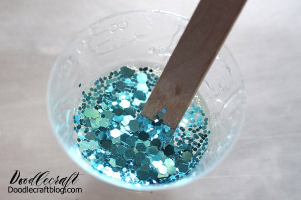 Step 1: Mix the Resin Begin by mixing up about a teaspoon of jewelry resin according to the package directions. Be sure to use the two phase mixing process as outlined. After mixing for the full time, dump the glitter into the resin and stir in.