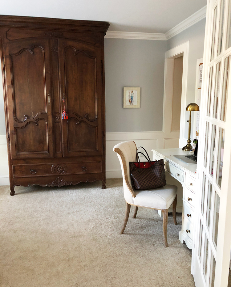 office with antique armoire and french doors