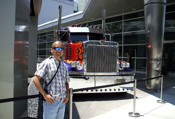 Posing in front of the Peterbilt truck that represents Optimus Prime in TRANSFORMERS: DARK OF THE MOON.