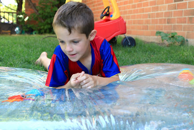 Plastic + duct tape + water — Delightful Learning