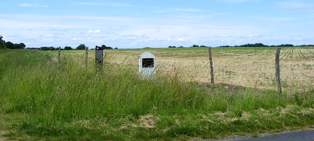 Memorial to a WWII parachute drop site, Indre.  France. Photographed by Susan Walter. Tour the Loire Valley with a classic car and a private guide.