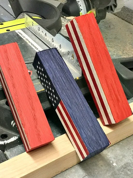 blocks painted with flags decoupaged on them