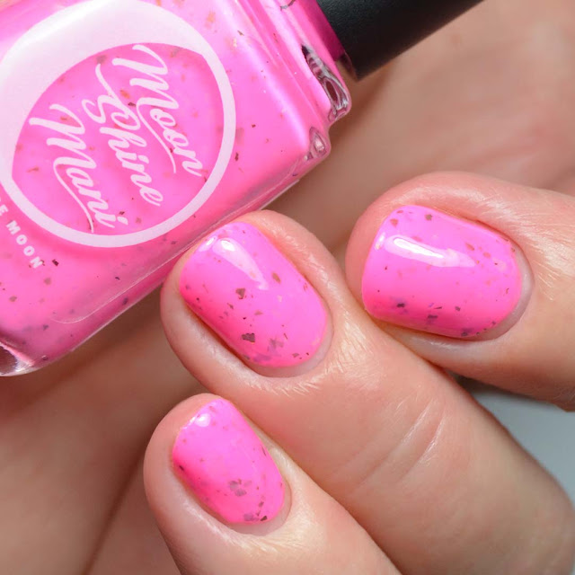 neon pink nail polish with color shifting flakies swatch