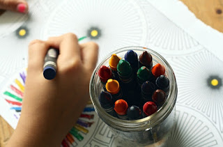 Photo of a child coloring