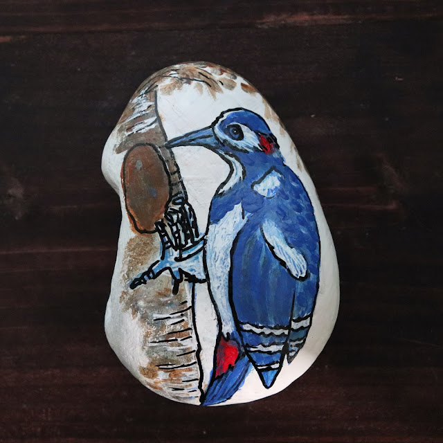 rock painting woodpecker