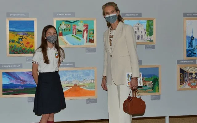 Infanta Elena attended the 30th edition of the Children and Youth Painting Contest for School Centers. The Infanta wore a cream blazer suit