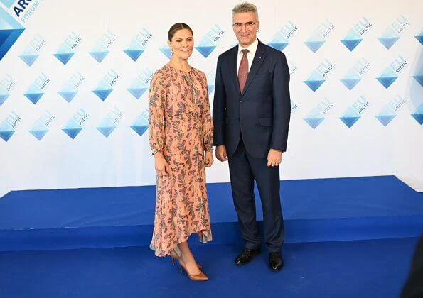 Crown Princess Victoria wore H&M print silk dress and Gianvito Rossi pumps, and Kreuger Jewellery rose gold poppy earrings